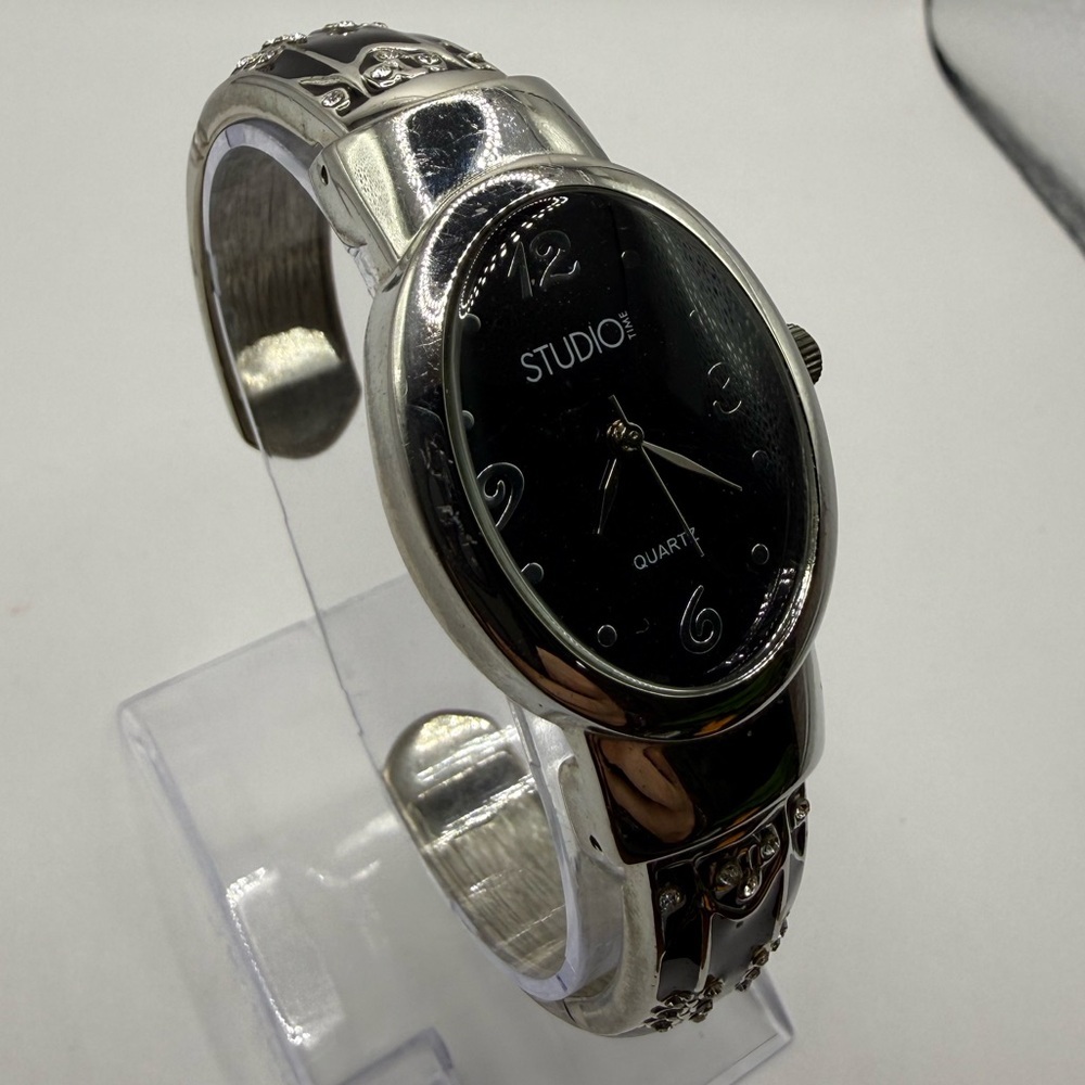 Studio Time Silver And Black Tone Analog Women’s Cuff Watch (New Battery)